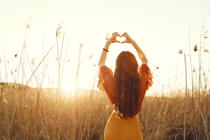 stylish-woman-spending-time-summer-field